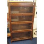 Four section oak 'Globe Wernicke' style bookcase, width 86cm, height 146cm.