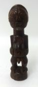 A carved wood African tribal figures, height 19cm.