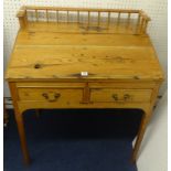 19th century pitch pine school desk, width 83cm.