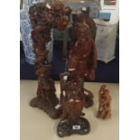 Collection of carved wood figures (4) tallest 49cm