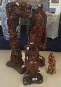Collection of carved wood figures (4) tallest 49cm