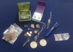 A collection of items including coins 1972 crown, necklaces, earrings, fountain pen etc