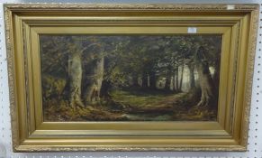 Williamson a pair of 19th century woodland landscapes in gilt frames, signed