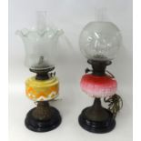 two Victorian oil lamps