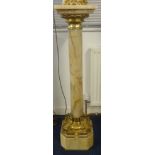 A marble column of French style with ormolu gilt decoration, height 109cm.