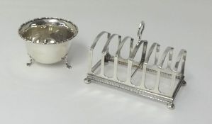 A silver six division toast rack and a sugar bowl (2).