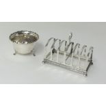 A silver six division toast rack and a sugar bowl (2).