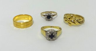Four various 18ct and 9ct gold dress rings. Combined weight 17.50g.