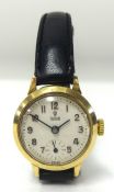 Tudor Rolex, a Ladies traditional wrist watch with 9ct gold case, the dial marked 'Tudor' with sub