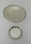 A silver stem dish and a silver commemorative coaster, combined weight approx 11.50oz.