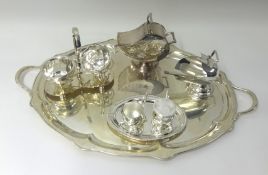 A large silver plated serving tray with handles, two sugar basins modelled as a coal scuttle & other