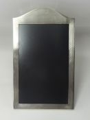 Mappin & Webb, a silver photograph frame, 22cm x 12cm.