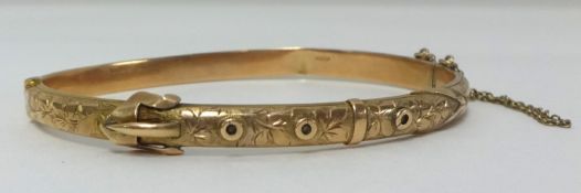 A 9ct gold bangle, approx 7.90gms.