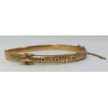 A 9ct gold bangle, approx 7.90gms.