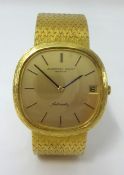 Audemars Piguet, a Gents Automatic 18ct gold dress wrist watch, with wallet.