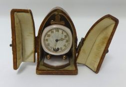 Breuet, a 1930/40's table clock with pink mother of pearl dial and travel case.