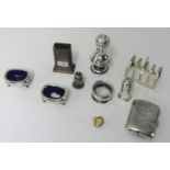 Various silver wares including toast rack, pair table saults, pepper pots