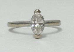 A diamond set marquise ring, as new with purchase receipt, finger size O.