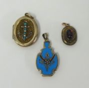 An enamelled and seed pearl set locket with 'anchor' decoration, two other lockets including gold,