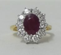 18ct yellow gold cluster ring with 2.5ct ruby and approx 2ct of diamonds