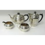 A Geo V four piece silver service comprising teapot, coffee pot, milk jug and sugar bowl, combined