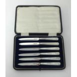 JD & S, a set of six cake knives with silver blades and mother of pearl handles, cased.