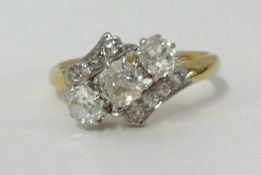 An antique diamond 3 stone ring, finger size O.