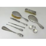 Silver backed hair brush, mirror, clothes brush, button hook and shoe horn, also 3 napkin rings