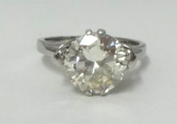 A fine single stone diamond ring, set with a round brilliant cut diamond, approx 3.00 carats, in a