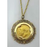 A Geo V 1914 gold sovereign, mounted in gold as a pendant with chain.