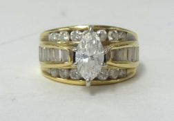 14k yellow gold and diamond ring, 3 band including round cut, baguette cut and a good size