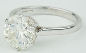 A fine diamond single stone ring, set with a modern brilliant cut diamond, weighing approx 4.00