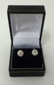 A good pair of diamond ear studs set in white gold, total diamond weight approx 2.00 carats.