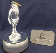 Swarovski Crystal Glass Stork on rotary slide show stand.