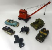 Various tinplate vintage toys including battery operated models cars etc.