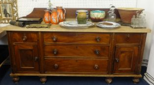A large Victorian mahogany dresser with pine 'scrub' top.