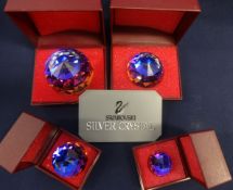 Swarovski Crystal Glass. Collection of Four Crystal Paperweights of different sizes, with blue