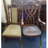 A Victorian carved walnut nursing chair and an open elbow chair (2).