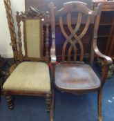 A Victorian carved walnut nursing chair and an open elbow chair (2).