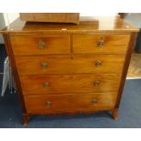 A 19th century mahogany chest of drawers on splayed bracket feet and reeded sides.