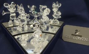 Swarovski Crystal Glass Disney Showcase Collection on a Crystal Home Display Set comprising
