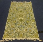A William Morris style bed cover and a middle eastern small rug (2)