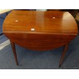 A mahogany Pembroke table with inlaid square tapering legs