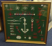 A large modern framed collection of nautical knots