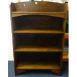 An oak free standing open bookcase