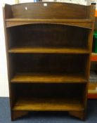 An oak free standing open bookcase