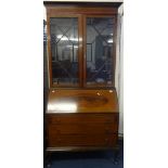 An Edwardian mahogany bureau bookcase