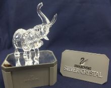 Swarovski Crystal Glass Trumpeting Elephant on Stand.