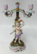 A 19th century German porcelain two branch candelabra