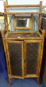 A Victorian bamboo and lacquered side cabinet with upstand